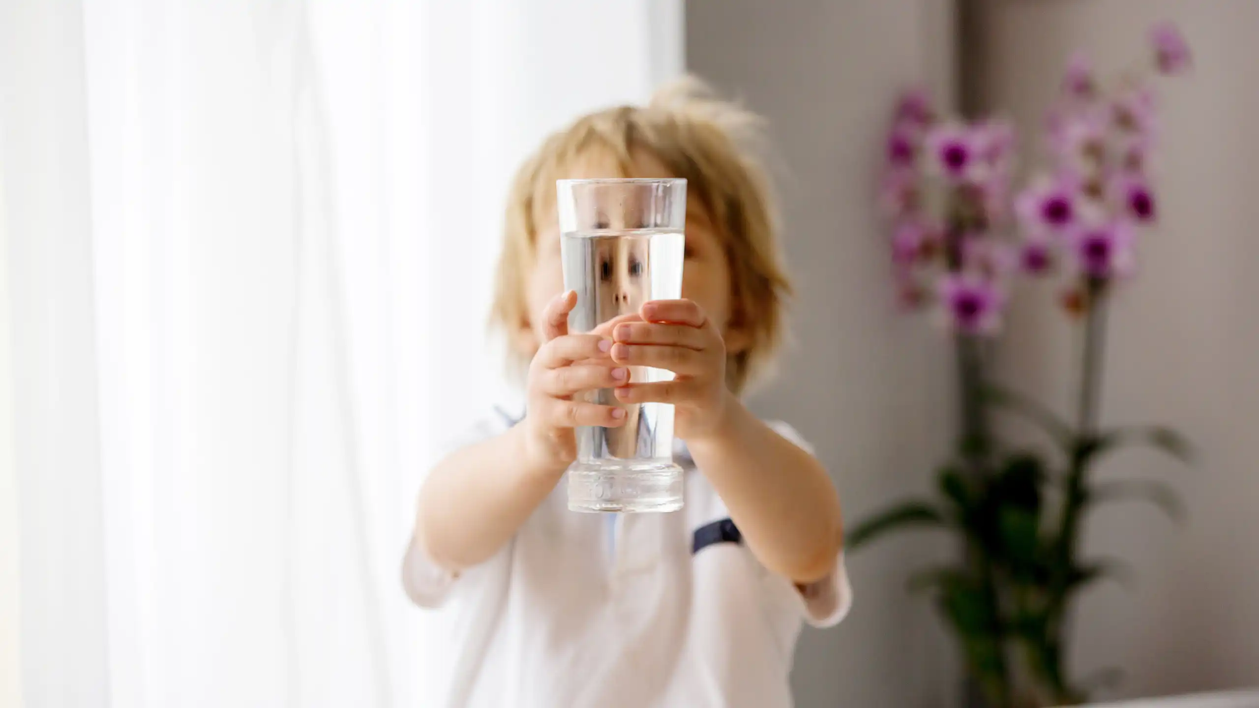 Alexin Analytical Child With Glass of Water