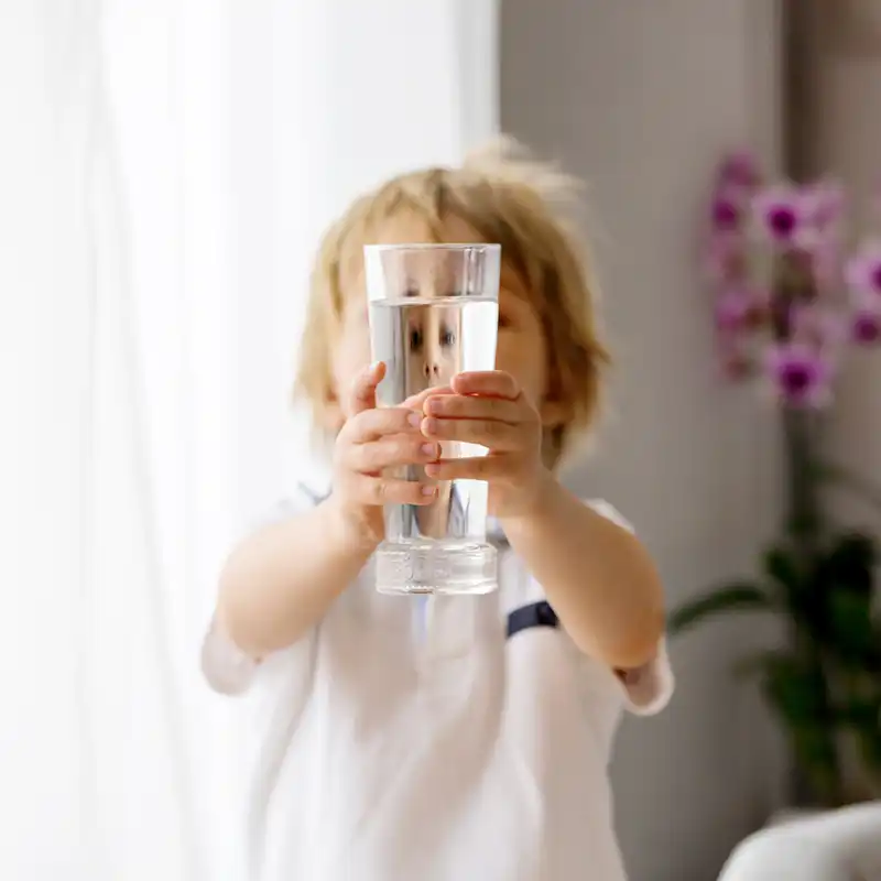 Alexin Analytical Child With Glass of Water